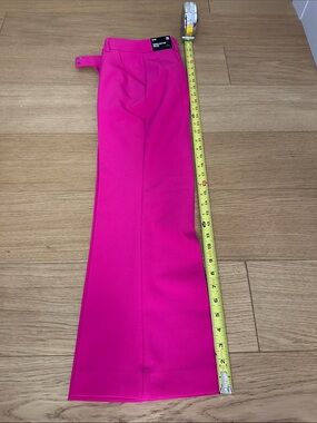 Women’s Pink Flared Dress Pants.